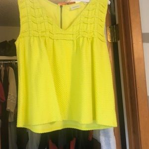 Bright yellow knit top